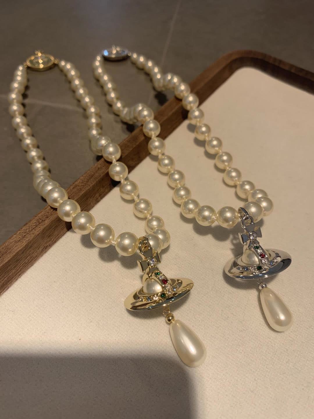 Vivienne Westwood Elegant Pearl Necklace with Pendant